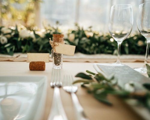 Details on table setting at wedding reception.